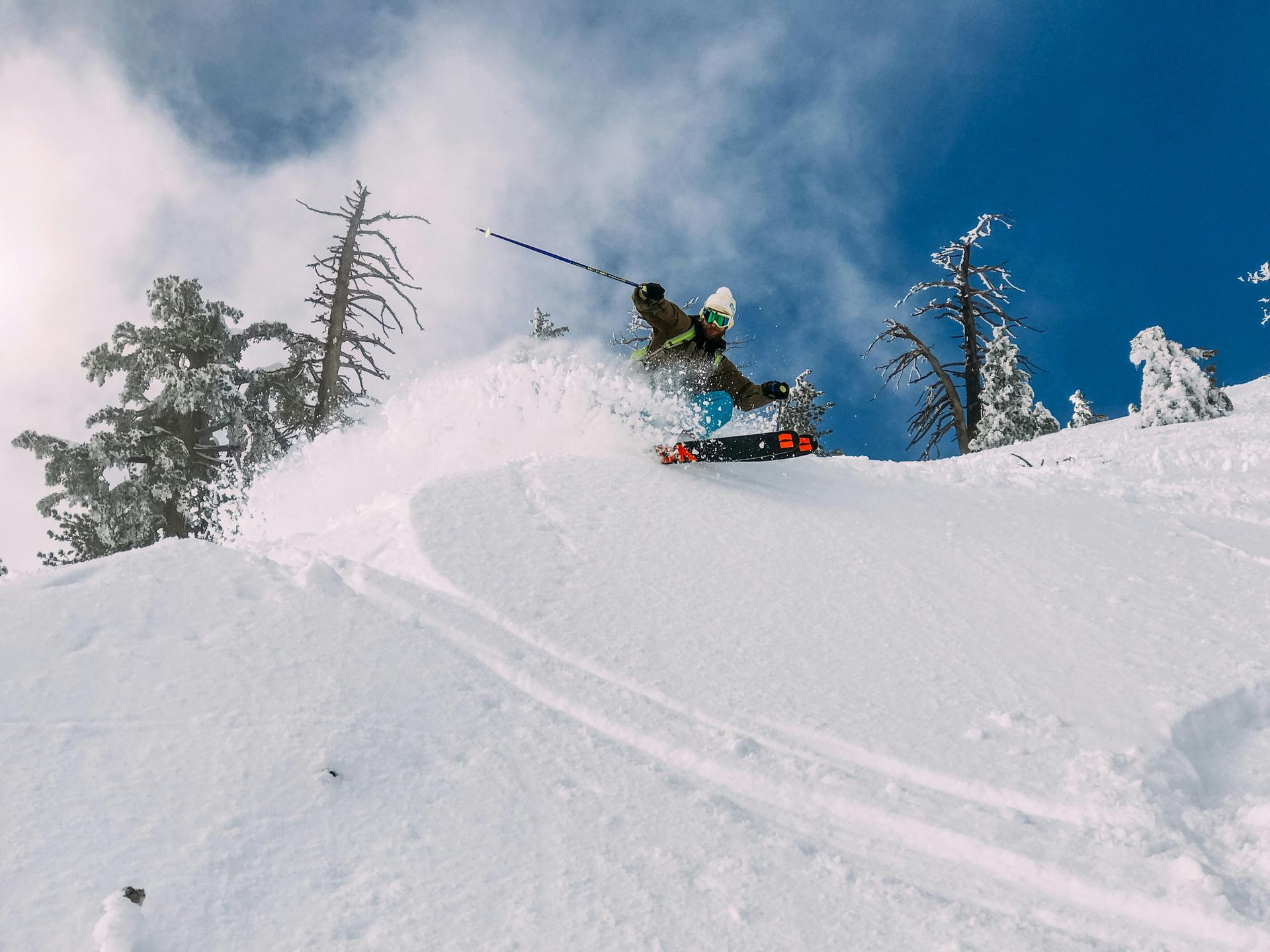 Skier on a snowy mountain slope